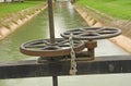 Wheels and cogs for floodgate controlling with lock Royalty Free Stock Photo