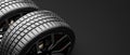 Wheels with modern alu rims on black Royalty Free Stock Photo