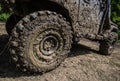 Wheels of off road car stuck full of mud Royalty Free Stock Photo