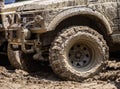 Wheels of off road car stuck full of mud Royalty Free Stock Photo