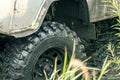 Wheels of an off-road vehicle in high water Royalty Free Stock Photo