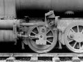 wheels on an old rusting abandoned steam locomotive with missing