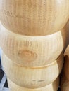 Wheels of parmegiano reggiano stacked for sale