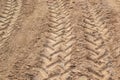 wheels tracks on the soil Royalty Free Stock Photo