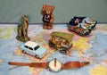 Where are we going on vacation? The symbols of the countrys on the map. Old Blue car, Thai keb, a bear from Berlin. I love Berlin.