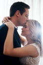 Where there is love, there is life. a handsome young groom affectionately kissing his wife on the forehead after their Royalty Free Stock Photo