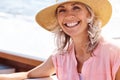 Where theres sea is where Ill be. Portrait of a mature woman enjoying a relaxing boat ride.