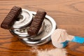 Whey protein powder in measuring scoop, protein bar, meter tape Royalty Free Stock Photo