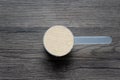 Whey protein powder with measuring Scoop, sports bodybuilding supplement Royalty Free Stock Photo