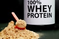 Whey Protein Powder in measuring scoop. Royalty Free Stock Photo