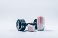 Whey protein shake in a glass next to scoop of powder Royalty Free Stock Photo