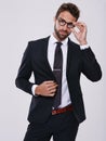 Whichever way you look at it, hes smart. Studio shot of a handsome and well-dressed young man. Royalty Free Stock Photo