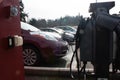 Nissan Leaf refilling electric battery at a charging station