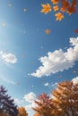 Whimsical Autumn Leaves Flying Across the Blue Sky