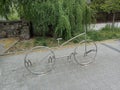 A whimsical bike rack that cleverly mimics the form of a bicycle