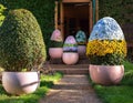 Whimsical Easter egg topiaries arranged at the entrance of a quaint garden party Royalty Free Stock Photo