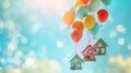 Whimsical Floating House Models Tied to Colorful Balloons with Copy Space Background
