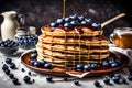 A whimsical image of a stack of fluffy, blueberry-studded pancakes with a drizzle of maple syrup