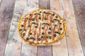 Whimsical Italian Pizza Recipe with Ham, Black Olives, Red Peppers, Mushrooms,