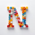 Whimsical Pill Letter W: Detailed Shapes And Vibrant Colors