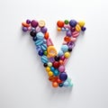 Whimsical Pill Letter Y: Detailed Shapes And Vibrant Colors