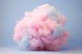 A whimsical pink cloud formation isolated on a pale blue background, embodying softness and abstract beauty