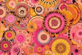 Whimsical and Playful Mandala Pattern in Bright Pinks and Yellows with Quirky Shapes and Doodles