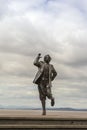 Whimsical statue of famous British comedian Eric Morecambe. Royalty Free Stock Photo