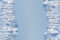 Whimsical surface ice closeup on blue sky background. Royalty Free Stock Photo