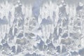Whimsical surface ice with snow closeup on blue sky background. Royalty Free Stock Photo