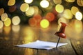 A Whimsical TiltShift Miniature Red Pushpin on a Blank Note Capturing Tiny World Detail Royalty Free Stock Photo