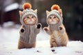 whimsical winter scene, cute cats adorned in stylish clothes playfully explore a snowy landscape.