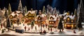 A miniature village with people and trees