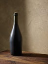 Whine bottle on wooden table Royalty Free Stock Photo