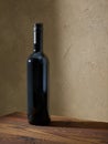 Whine bottle on wooden table Royalty Free Stock Photo