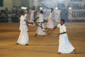 Whip Crackers enter the procession ground at the Kataragama Festival in Sri Lanka.