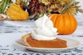 Whip cream loaded on pumpkin pie Royalty Free Stock Photo