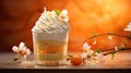 Whipped cream and apricot dessert and a flowering branch on a peach background