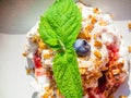 whipped cream with berry and oatmeal, delicious dessert