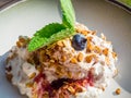 whipped cream with berry and oatmeal, delicious dessert