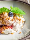 whipped cream with berry and oatmeal, delicious dessert