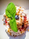 whipped cream with berry and oatmeal, delicious dessert