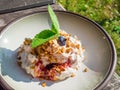 whipped cream with berry and oatmeal, delicious dessert