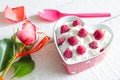 Whipped cream dessert with raspberry in heart valentines food love concept Royalty Free Stock Photo