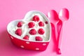 Whipped cream dessert with raspberry in heart valentines food love concept