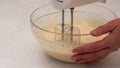 Whipped cream recipe, mixing ingredients in a glass bowl