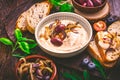 Whipped feta cheese dip with garlic, olives, lemon and caramelized onions