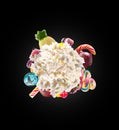 Whipped round cream with colored sweets, jelly and candies isolated. Sweet life concept. Sweet dessert - whipped milk