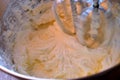 Whipping homemade vanilla icing in stand mixer