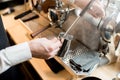 Whipping a milk with professional coffee machine Royalty Free Stock Photo